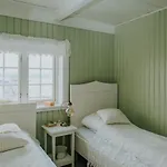 호텔 Husfrua Gardshotell 스트라우멘